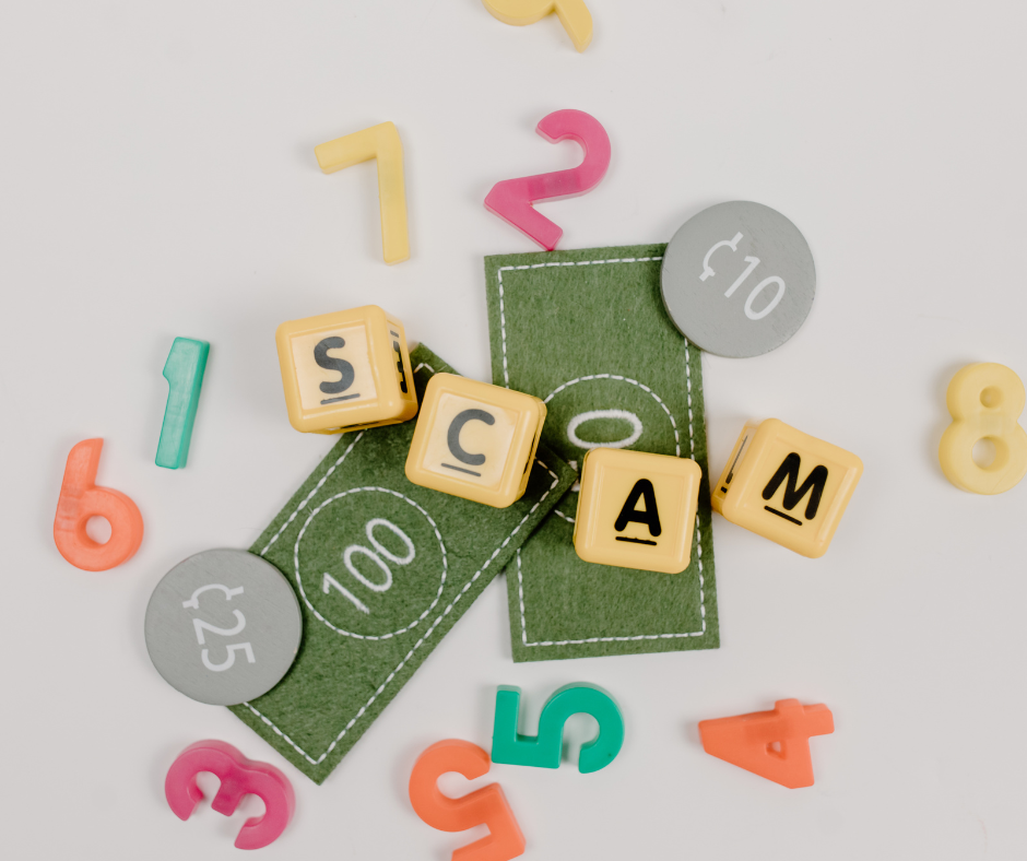 Small blocks that spell out "Scam"