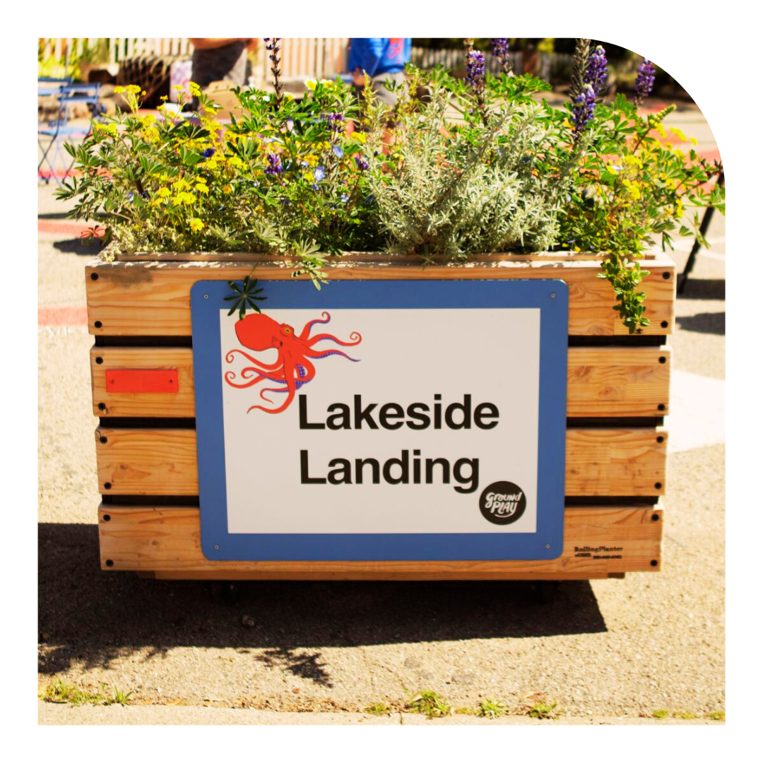 Photo of a planter with a sign reading Lakeside Landing