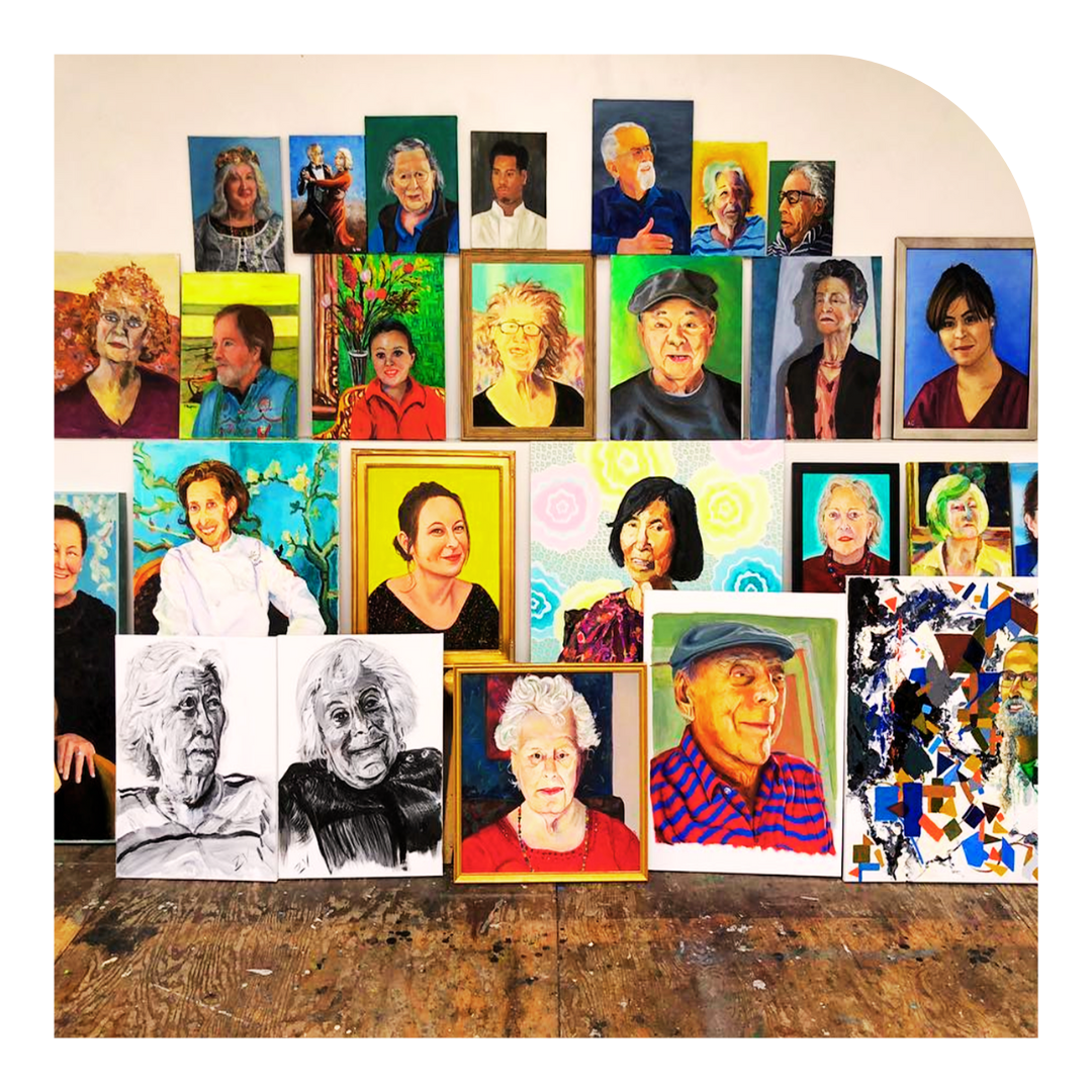 Photo of colorful painted portraits hanging on a wall