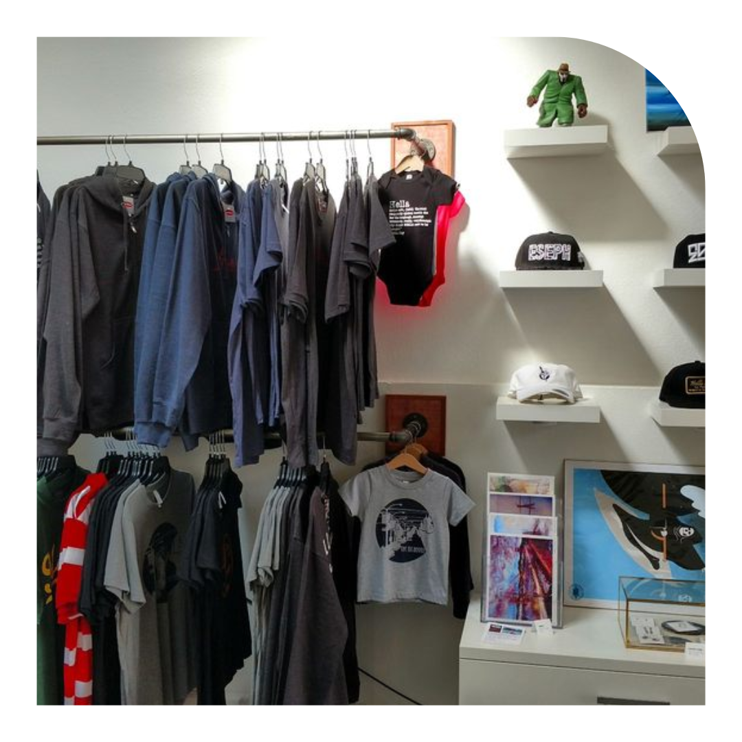 photo of a rack of men's clothing in a store