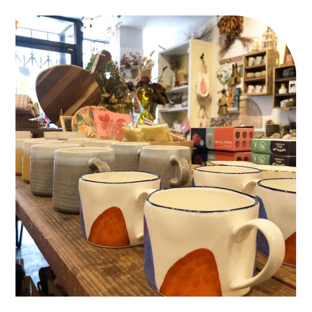 PHoto of mugs in a shop display