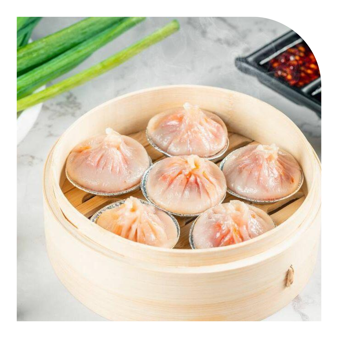 photo of a steamer filled with dumplings