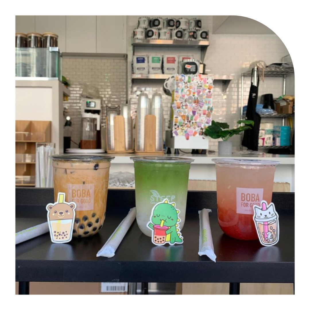Photo of 3 boba drinks on a counter