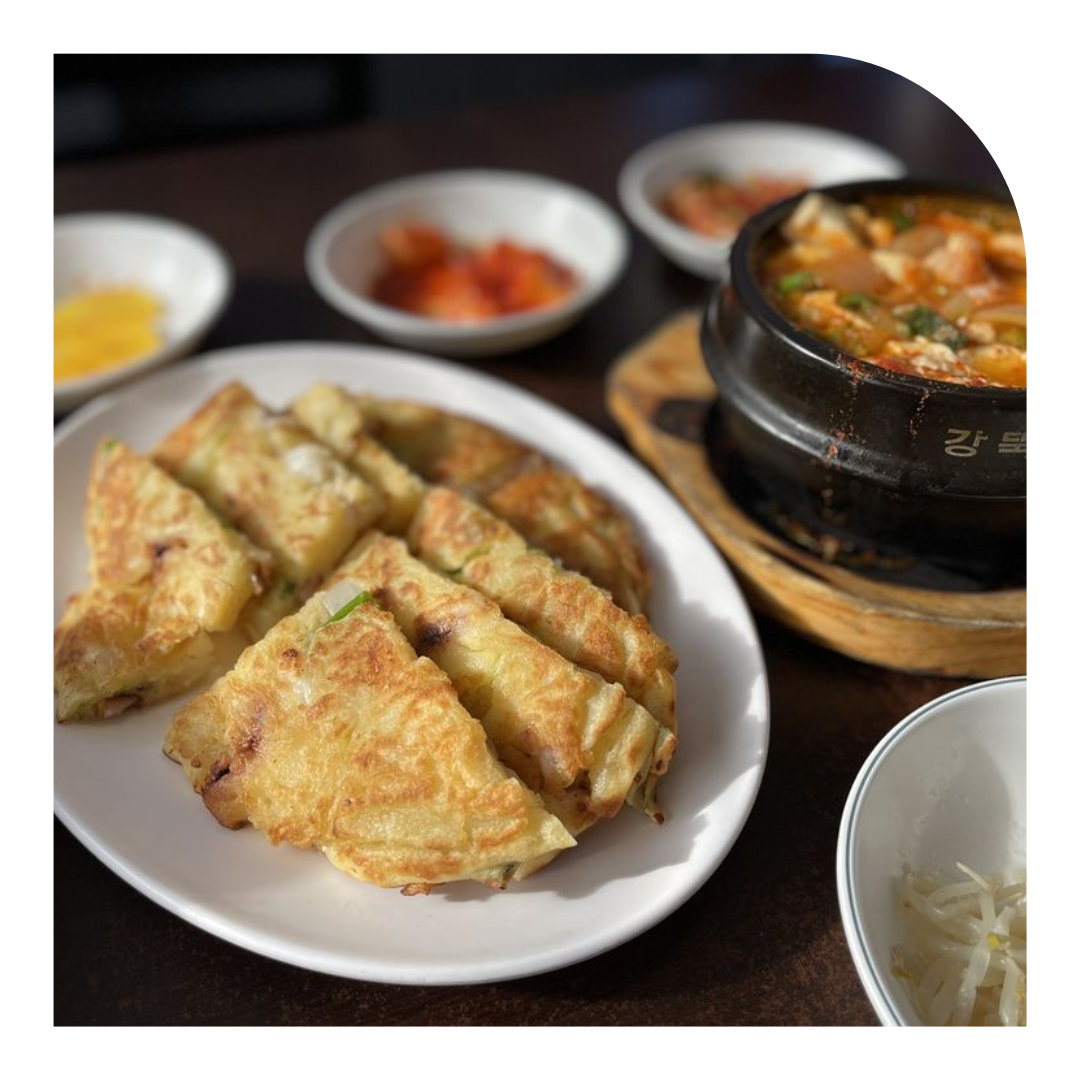photo of a table of Korean dinner cuisine
