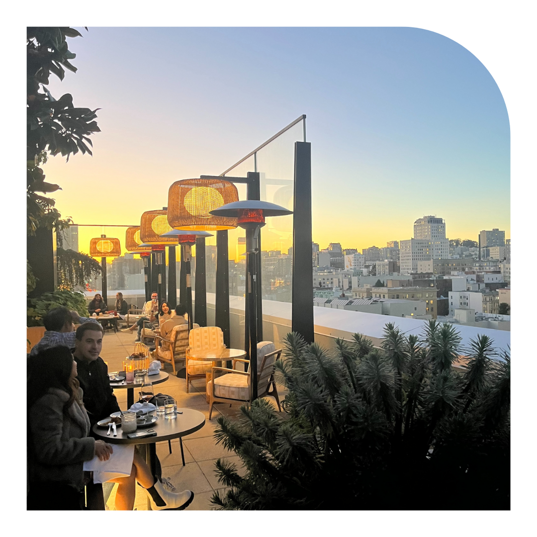 photo of a rooftop bar at sunset