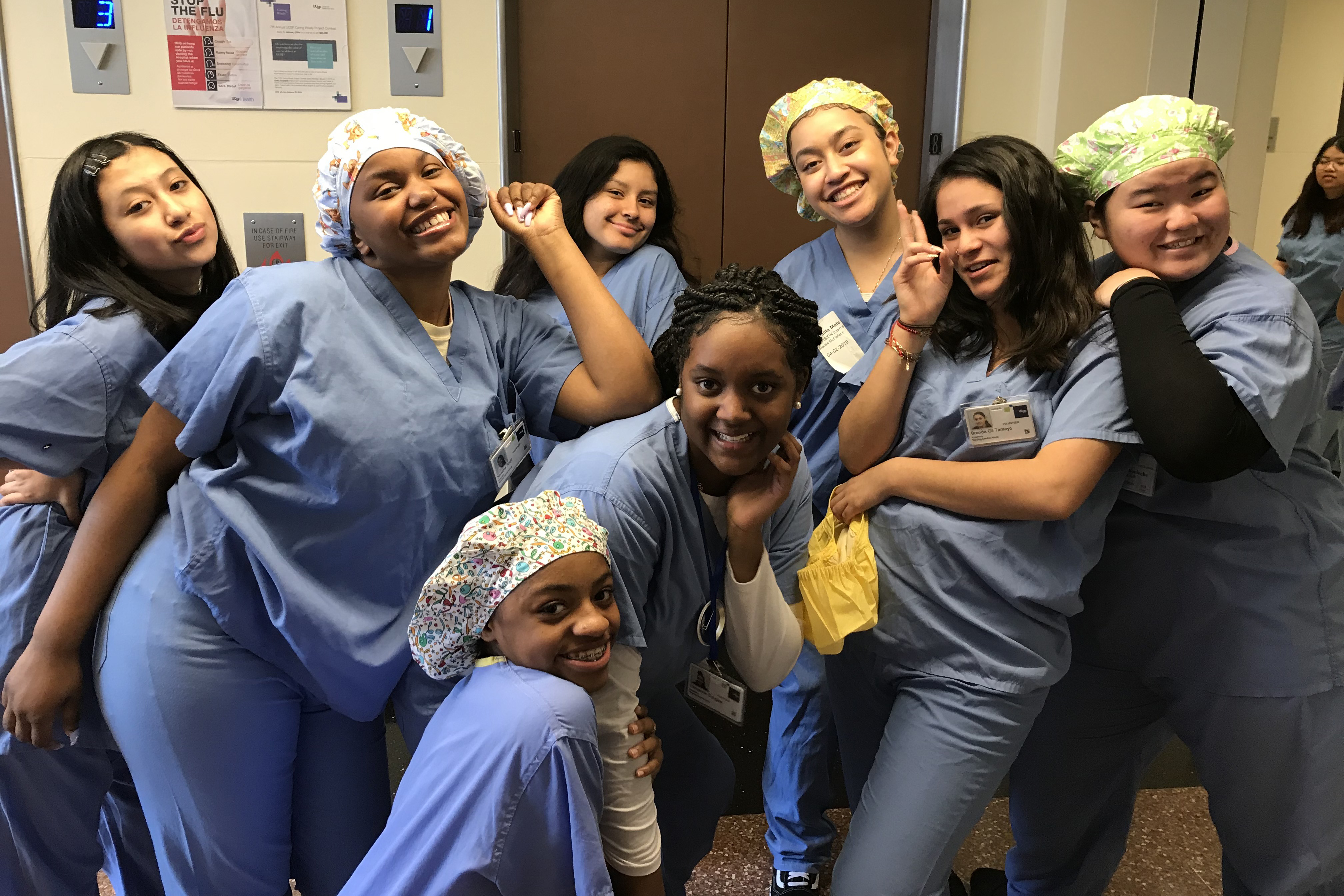 A group of young women in hospital scrubs