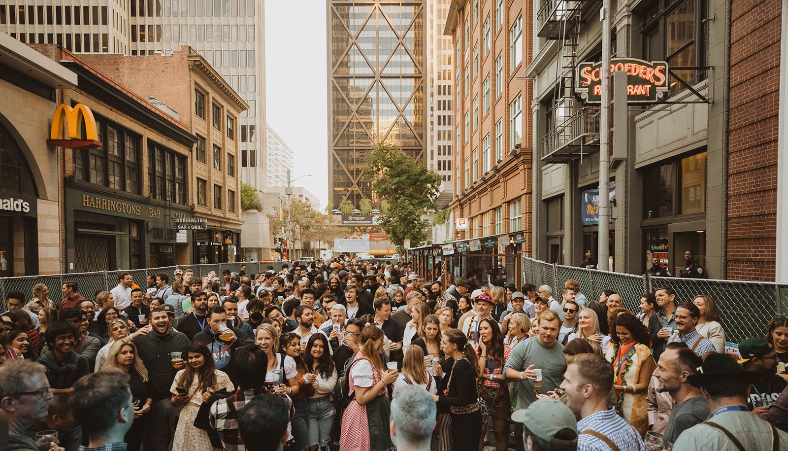 A row of people in an alley