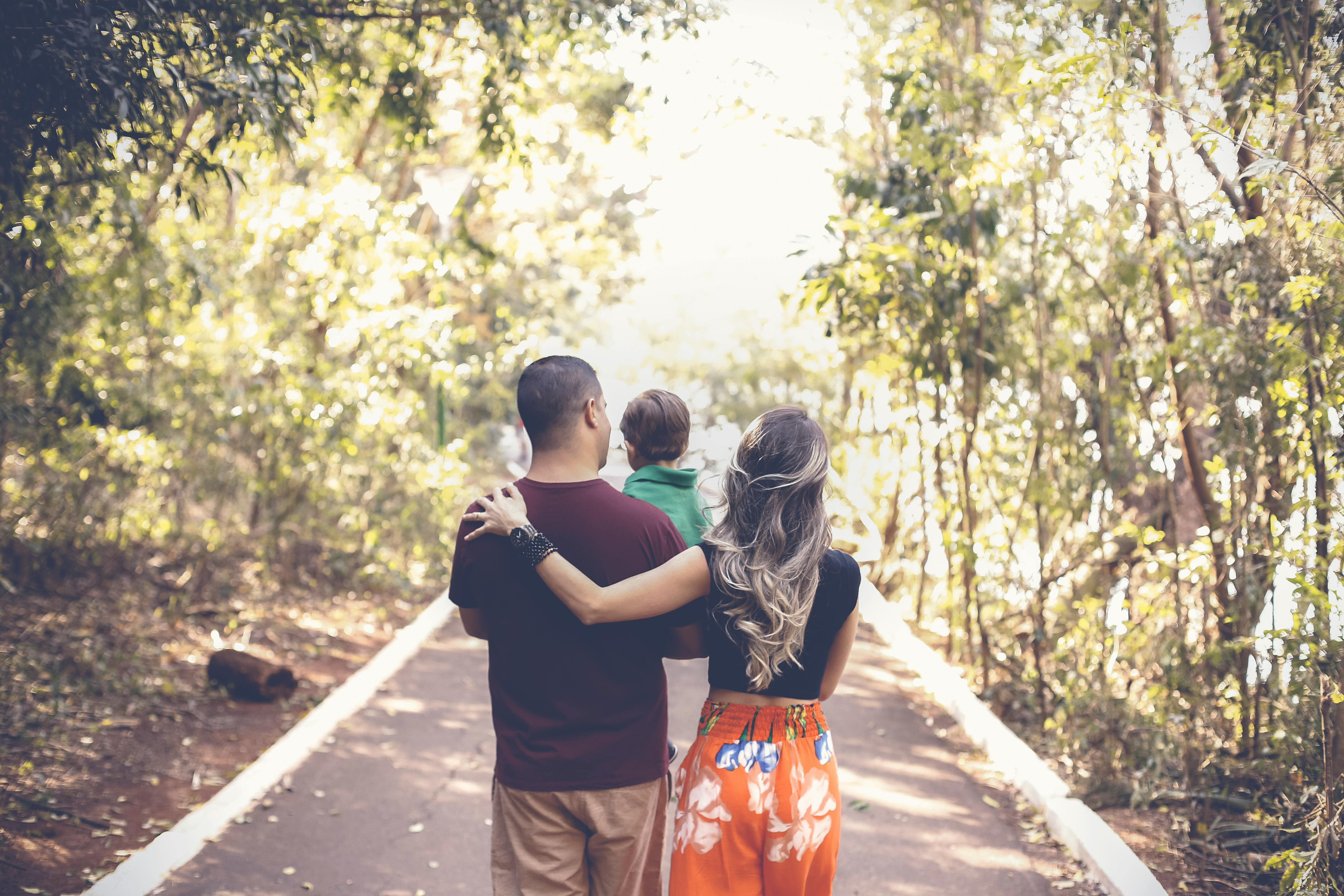 a family walking away from the camera