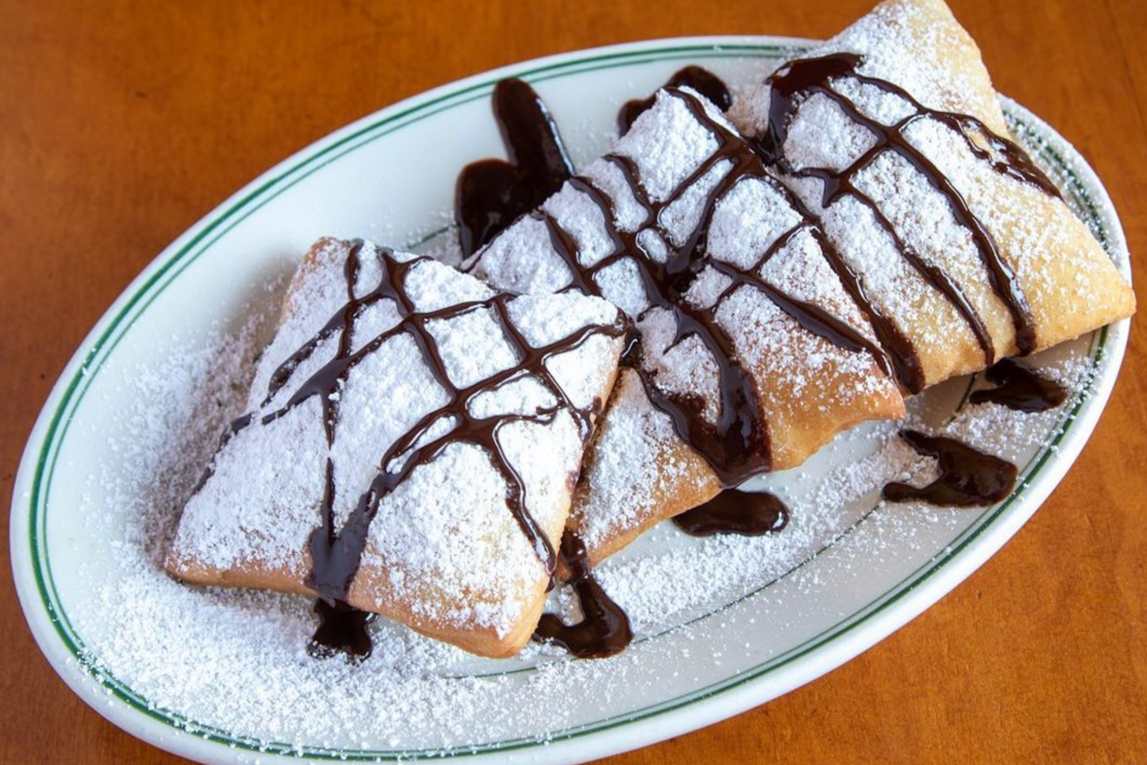 photo of a plate of beignets