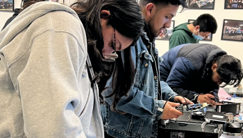 Young people learning to build computers