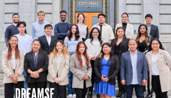 DreamSF Fellows smile and pose in a group picture outside of San Francisco City Hall