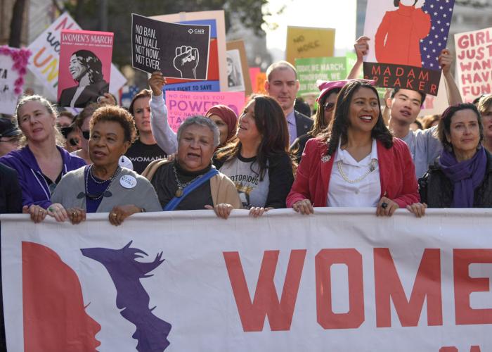 Mayor London Breed and others marching with sign at Women's March