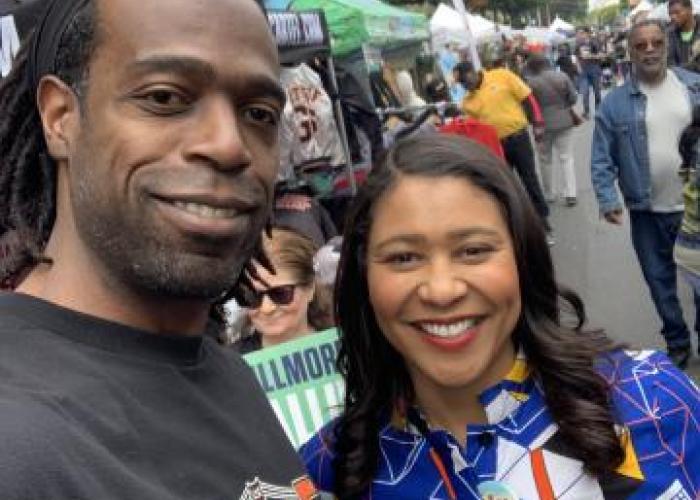 MOHCD employee Malik Looper and Mayor London Breed at SF Juneteenth.