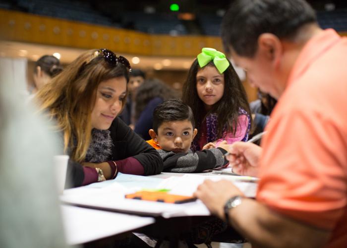 Family gets filling out their US citizenship application form