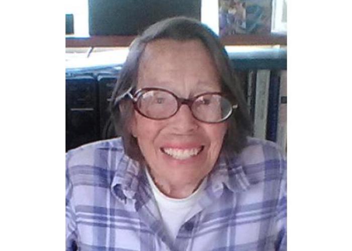 Image of Phyllis Lyon from 2016. She is wearing glasses smiling and looking straight at the camera. Photo credit Joyce Newstat.