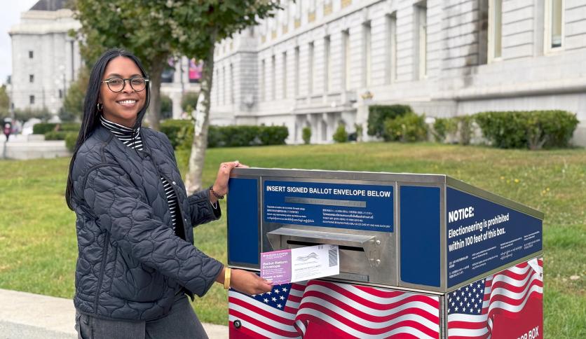 San Francisco voter dropping off their ballot at an official ballot dropbox