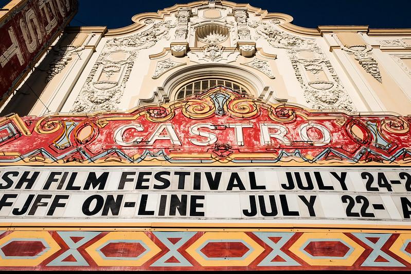 Looking up at the Castro Theatre marguee closeup on a sunny day, advertising a film festival.