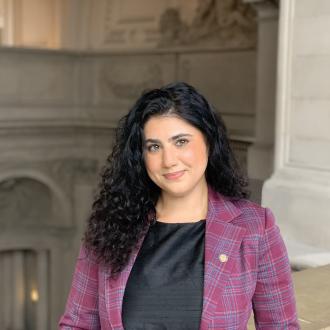 Headshot of Commissioner Zouzounis in City Hall 